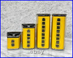 Mid-Century Atomic Yellow Enamel Window Front Canisters by Lincoln Set of 4