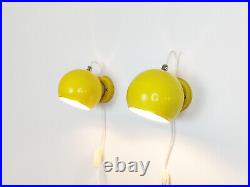 Mid century atomic eyeball lamps, yellow globe lights. Scandinavian design