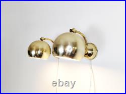 Pair of mid century atomic eyeball lamps, gold globe lights, Swedish Scandinavia
